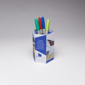 Red Paper Plane's Hexagon Pen Pot acts as a functional container that prospects will keep on their desks, as a great reminder of your brand.