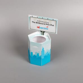Red Paper Plane's Hexagon Pen Pot acts as a functional container that prospects will keep on their desks, as a great reminder of your brand.