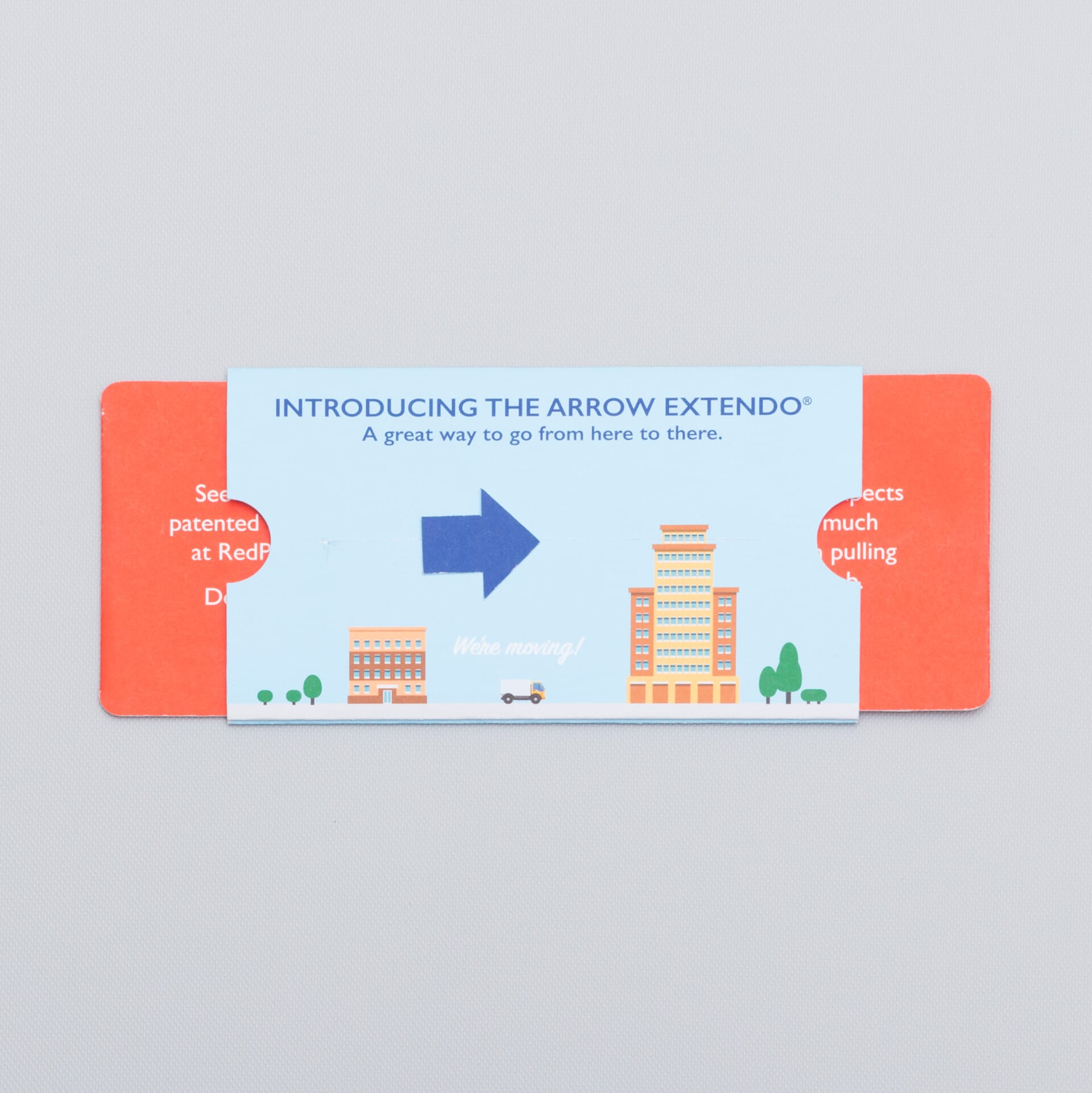 The Arrow Extendo reveals two hidden panels when the tab is pulled, also causing the arrow die cut to slide