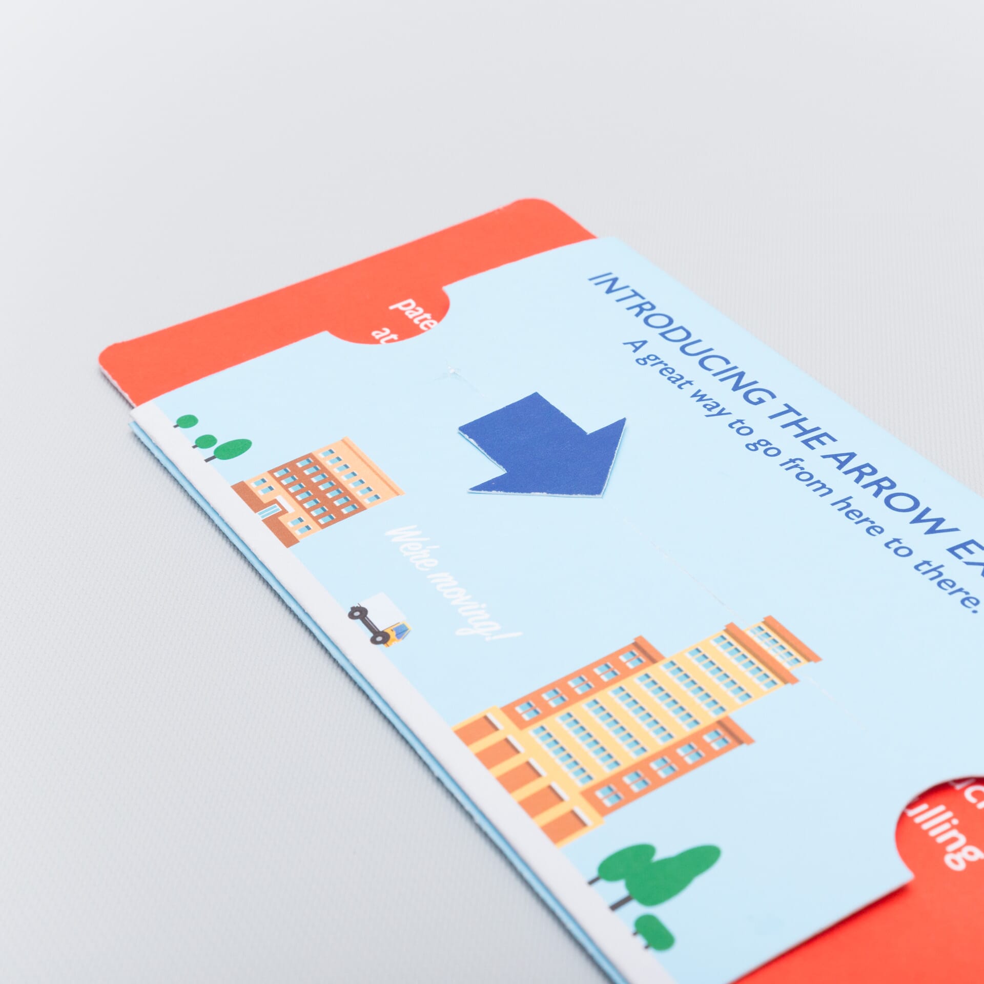 The Arrow Extendo reveals two hidden panels when the tab is pulled, also causing the arrow die cut to slide
