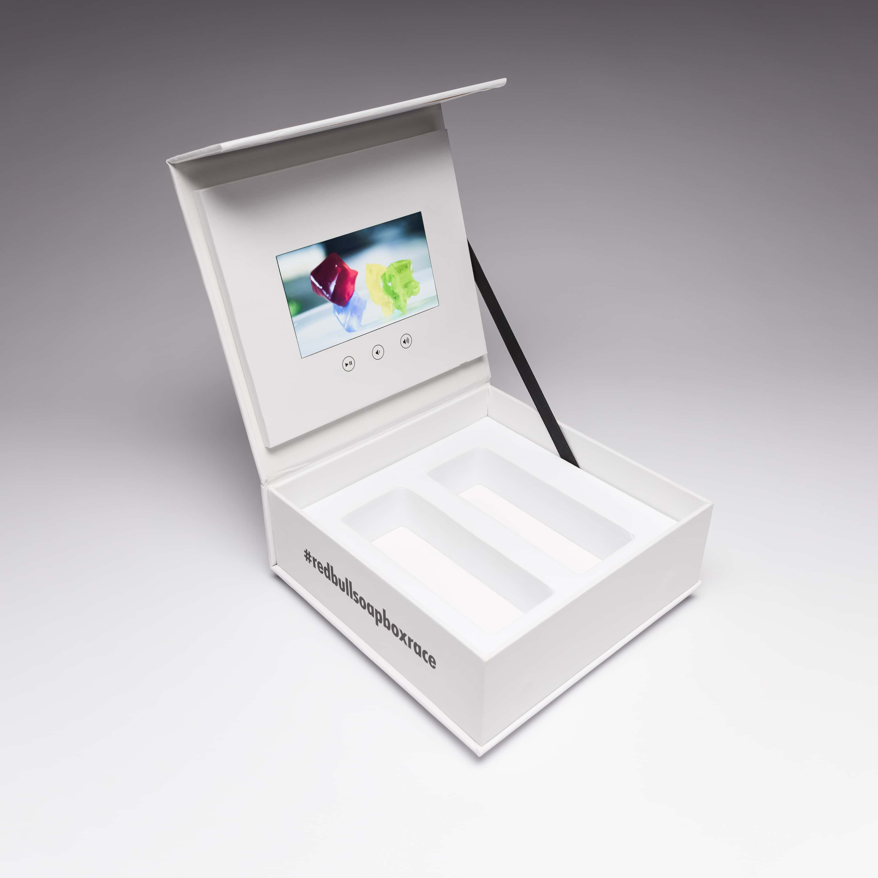 Red Bull used Red Paper Plane's 4.3" Video Screen Box for a promotional campaign. This product is perfect for any promotional campaign because your samples and gifts are presented a professional manner to your target audience, with engaging video content 