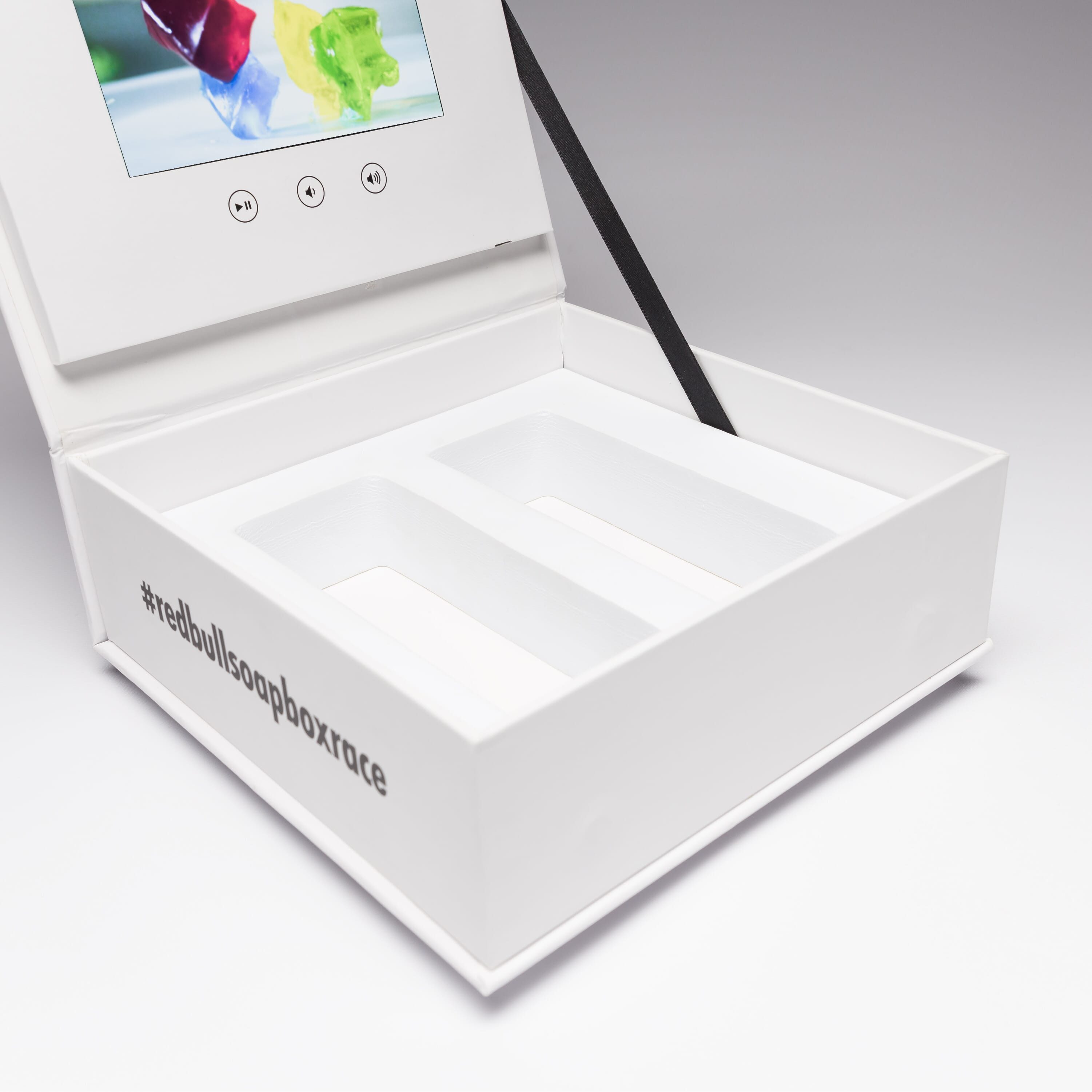 Red Bull used Red Paper Plane's 4.3" Video Screen Box for a promotional campaign. This product is perfect for any promotional campaign because your samples and gifts are presented a professional manner to your target audience, with engaging video content 