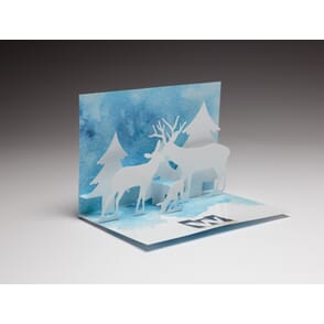 Red Paper Plane's Snow Scene Holiday Card features an intricate staged holiday design.